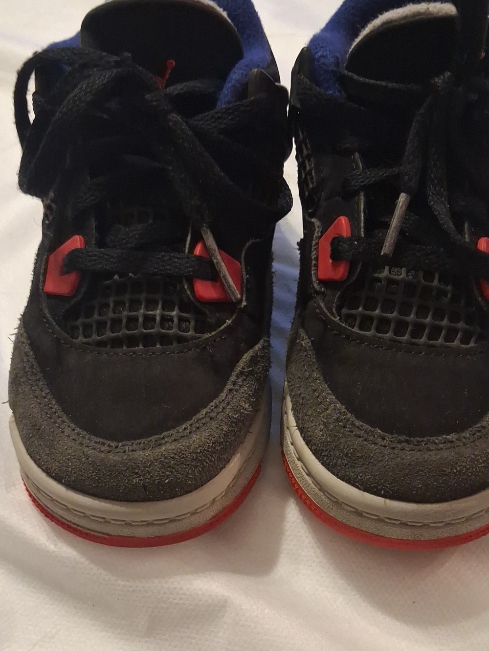 Nike Kids Black and Gray Sneakers with Red Accents